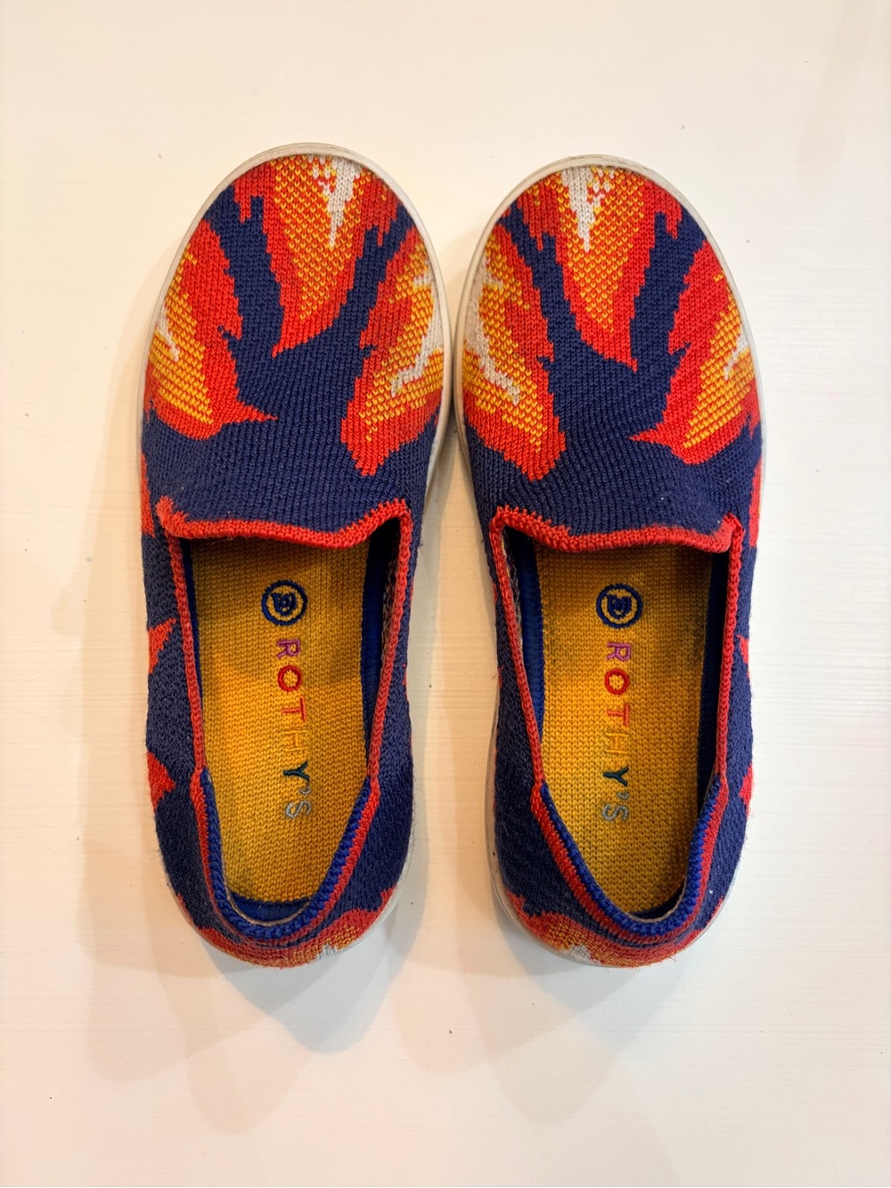 Rothy's “The Kid” Slip-On Sneakers in Navy, Orange & Yellow Flame Knit Size 1